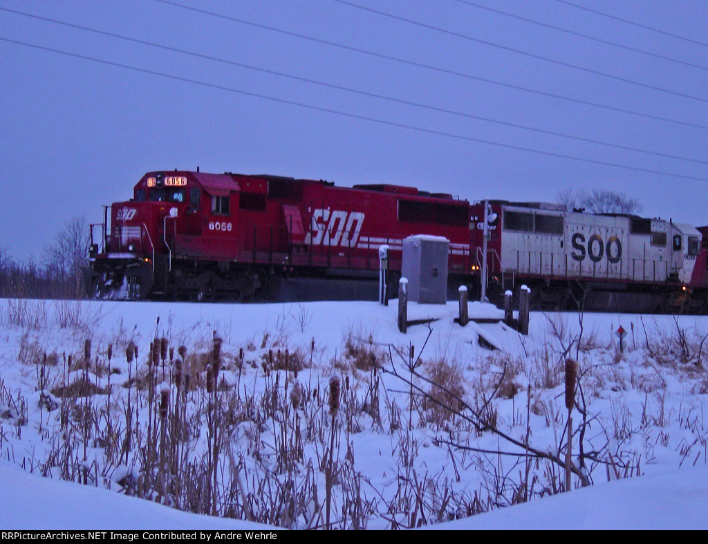 SOO 6056 & 6035 pause for a crew change at sunset